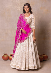 White Silk Lehenga with Pink Bandhej Dupatta