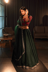 Bottle green silk lehenga pair