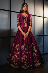 Purple silk lehenga paired with a stylish jacket