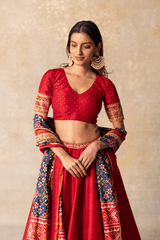 Red silk lehenga with patola dupatta