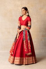 Red silk lehenga with patola dupatta