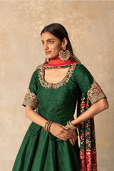 Green silk lehenga with patola dupatta