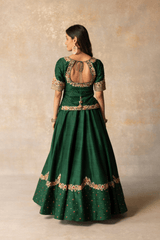 Green silk lehenga with patola dupatta