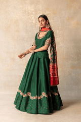 Green silk lehenga with patola dupatta