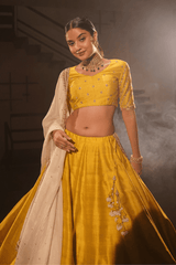 Radiant yellow silk lehenga and blouse with georgette dupatta