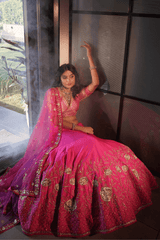 Graceful pink silk lehenga & blouse with  net dupatta