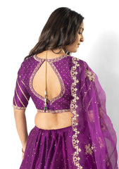 Bright purple lehenga, blouse and organza dupatta